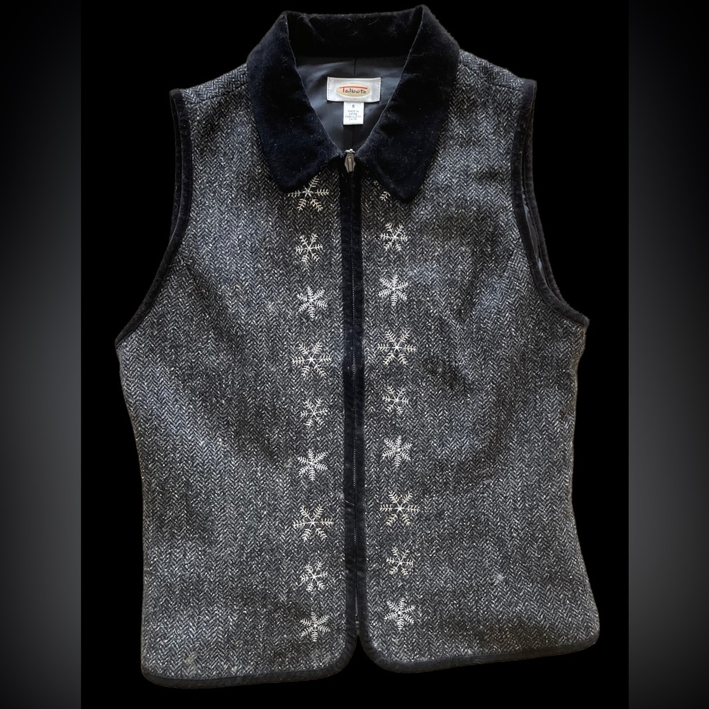 Tweed velvet trimmed, zip front fitted vest.